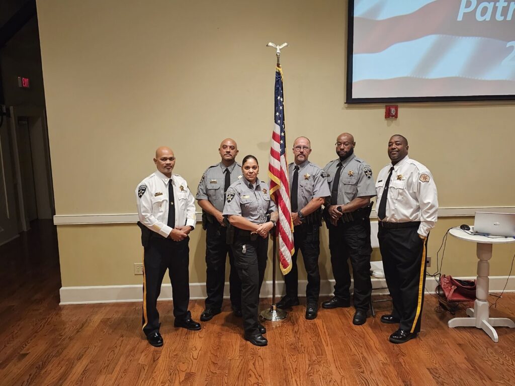 Sheriff Tyrone Smith with newly sworn officers
